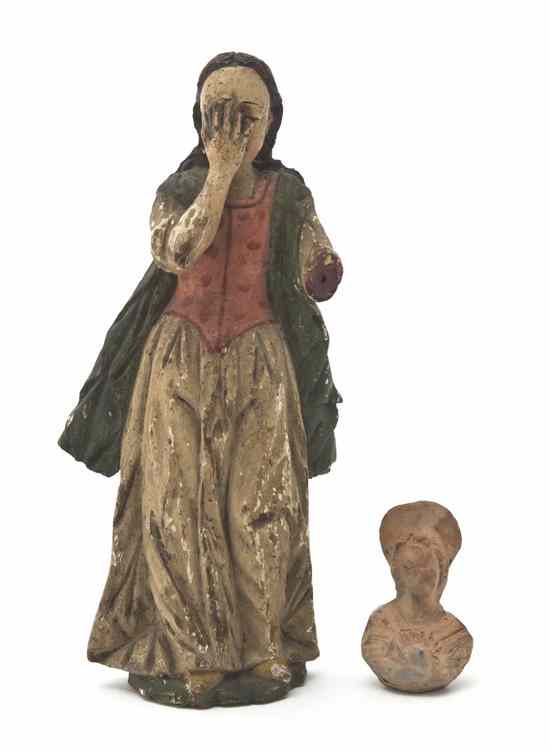 Appraisal: A Continental Carved and Polychrome Figure depicting a woman with