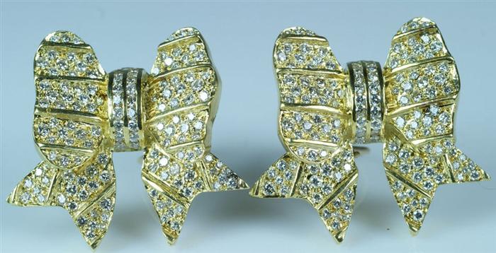 Appraisal: Pr unmarked K YG bowtie diamond earrings each pave set