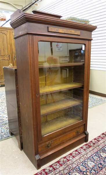 Appraisal: A VICTORIAN WALNUT CABINET BOOKCASE American last quarter of the