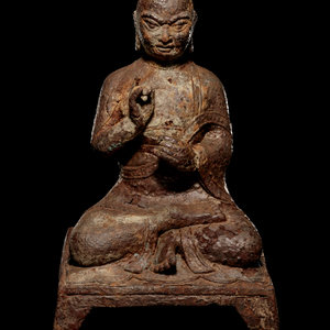 Appraisal: A Tibetan Cast Iron Figure of a Monk the figure