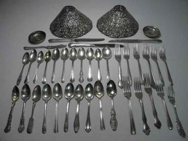 Appraisal: Lot of assorted sterling silver utensils and more Includes solid