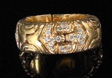 Appraisal: Eighteen-Karat Gold and Diamond Bulgari Lady's Ring of spring-opening design