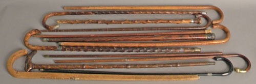 Appraisal: Group of canes to include a sword cane and a