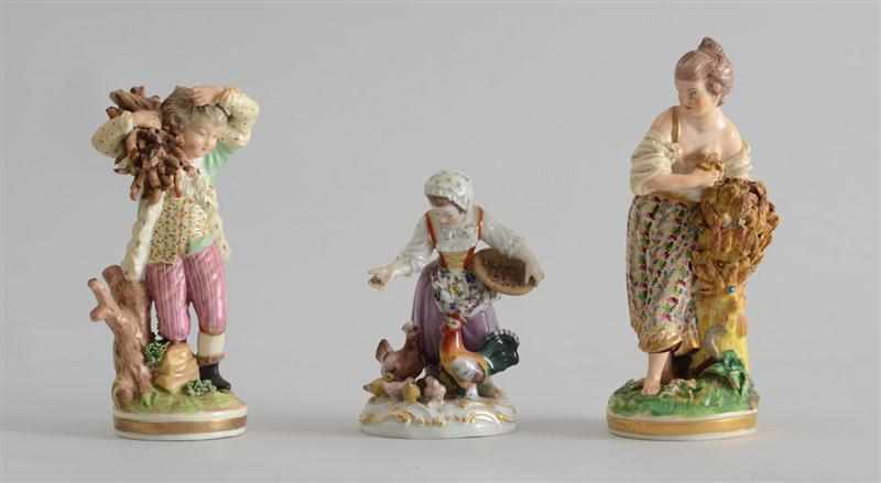 Appraisal: TWO MEISSEN PORCELAIN FIGURES Modeled as a girl feeding hens