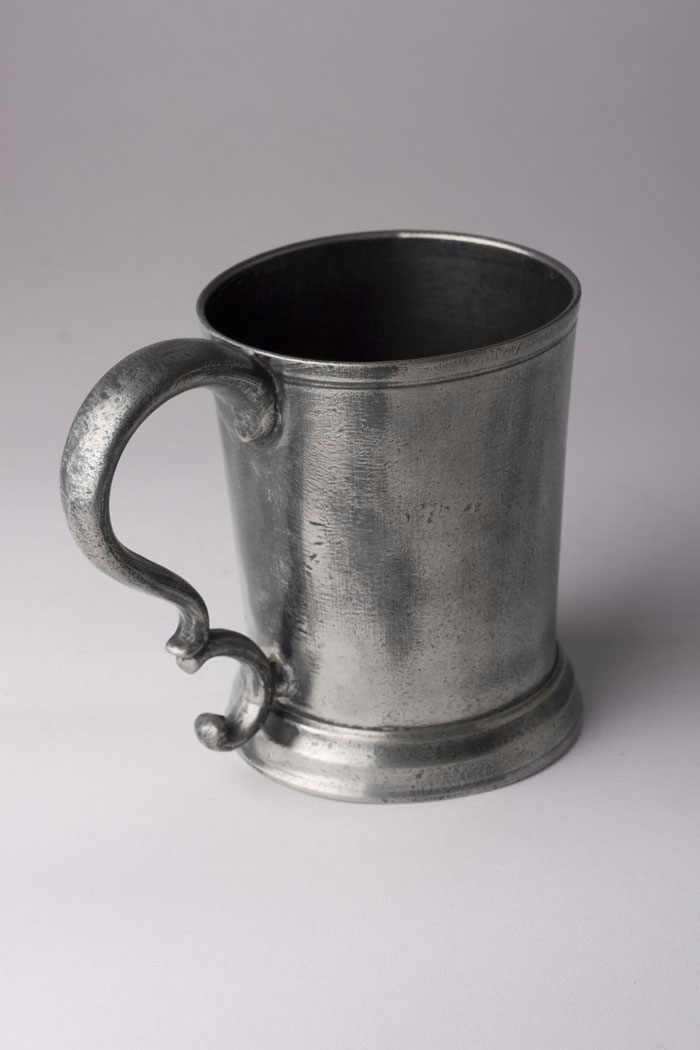 Appraisal: PEWTER HANDLED BEAKER NELSON HALL AND FREDERICK COTTON Middlefield Connecticut