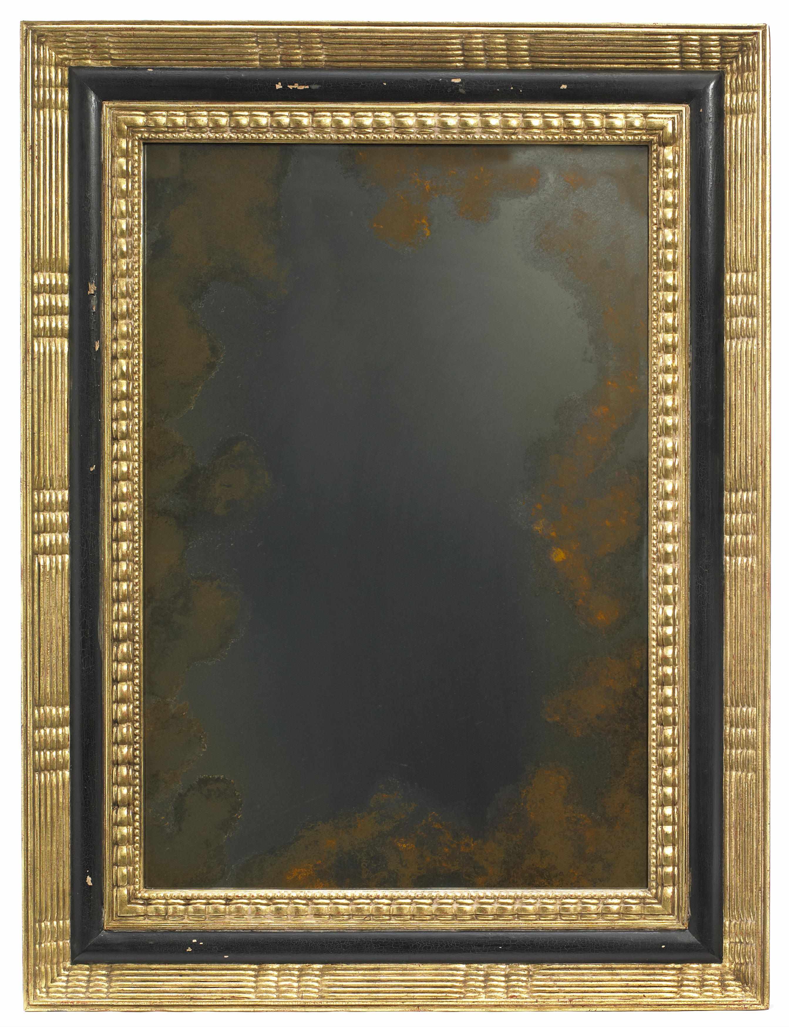 Appraisal: A Baroque style parcel ebonized and giltwood mirror height in