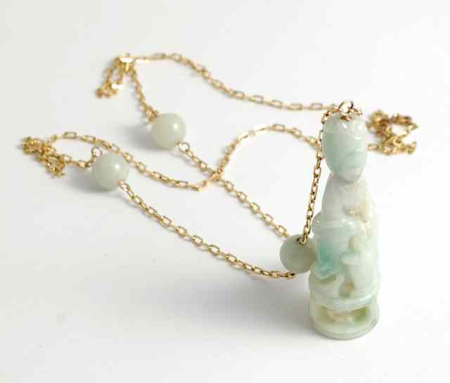 Appraisal: JADE AND YELLOW GOLD CHINESE NECKLACE The k yellow gold