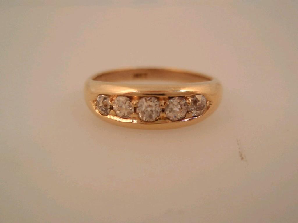 Appraisal: A gypsy style diamond set ring old cut small diamonds