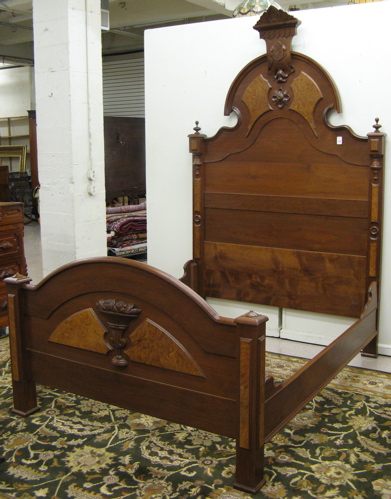 Appraisal: A VICTORIAN WALNUT BEDSTEAD WITH RAILS Renaissance Revival design American