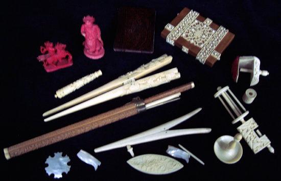 Appraisal: A small group of ivory items including glove stretchers carved