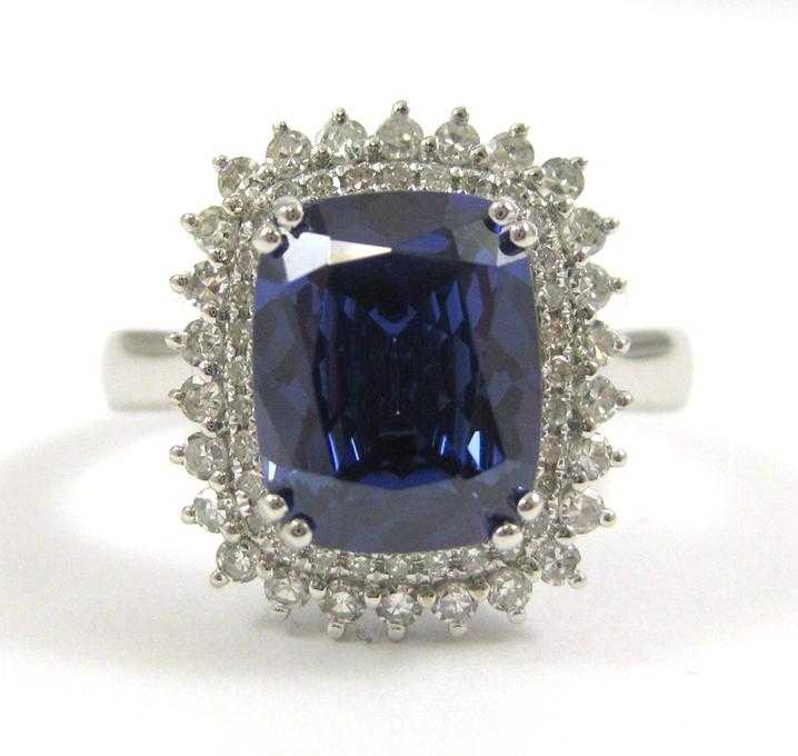 Appraisal: TANZANITE DIAMOND AND FOURTEEN KARAT GOLD RING The white gold