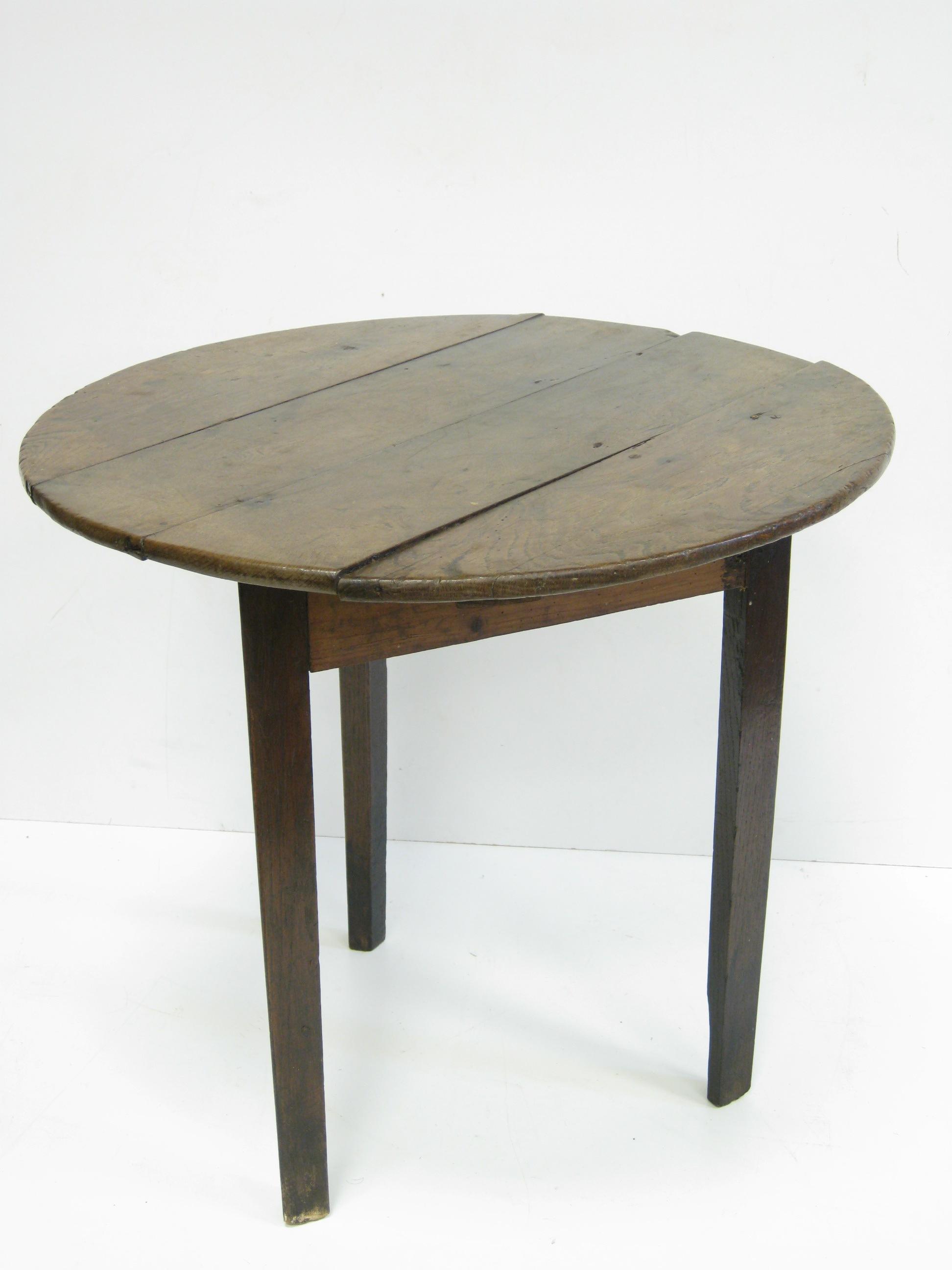 Appraisal: An antique oak Cricket Table with chamfered support ft in