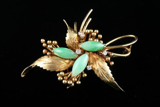 Appraisal: K YELLOW GOLD JADE AND DIAMOND FLORAL MOTIF BROOCH Floral