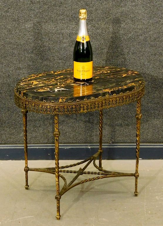 Appraisal: Attrib Oscar Bach Wrought Iron Marble Top Table United States