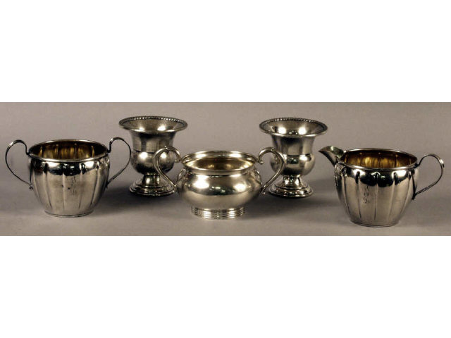 Appraisal: Collection of sterling silver pieces includes matching cream and sugar