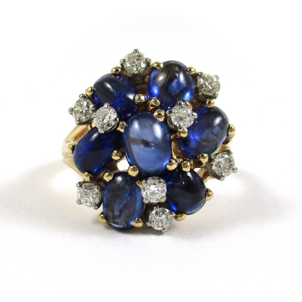 Appraisal: SAPPHIRE DIAMOND AND FOURTEEN KARAT GOLD RING with a cluster