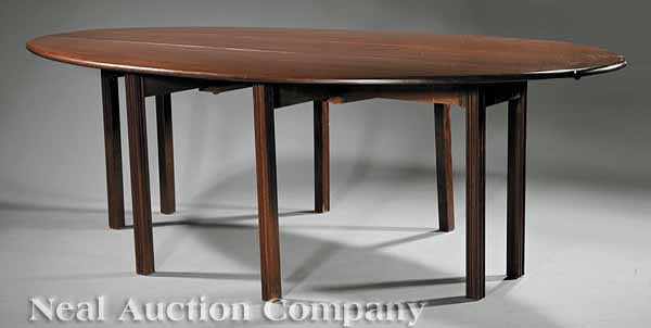 Appraisal: A George III-Style Mahogany Wake Table oval top with drop