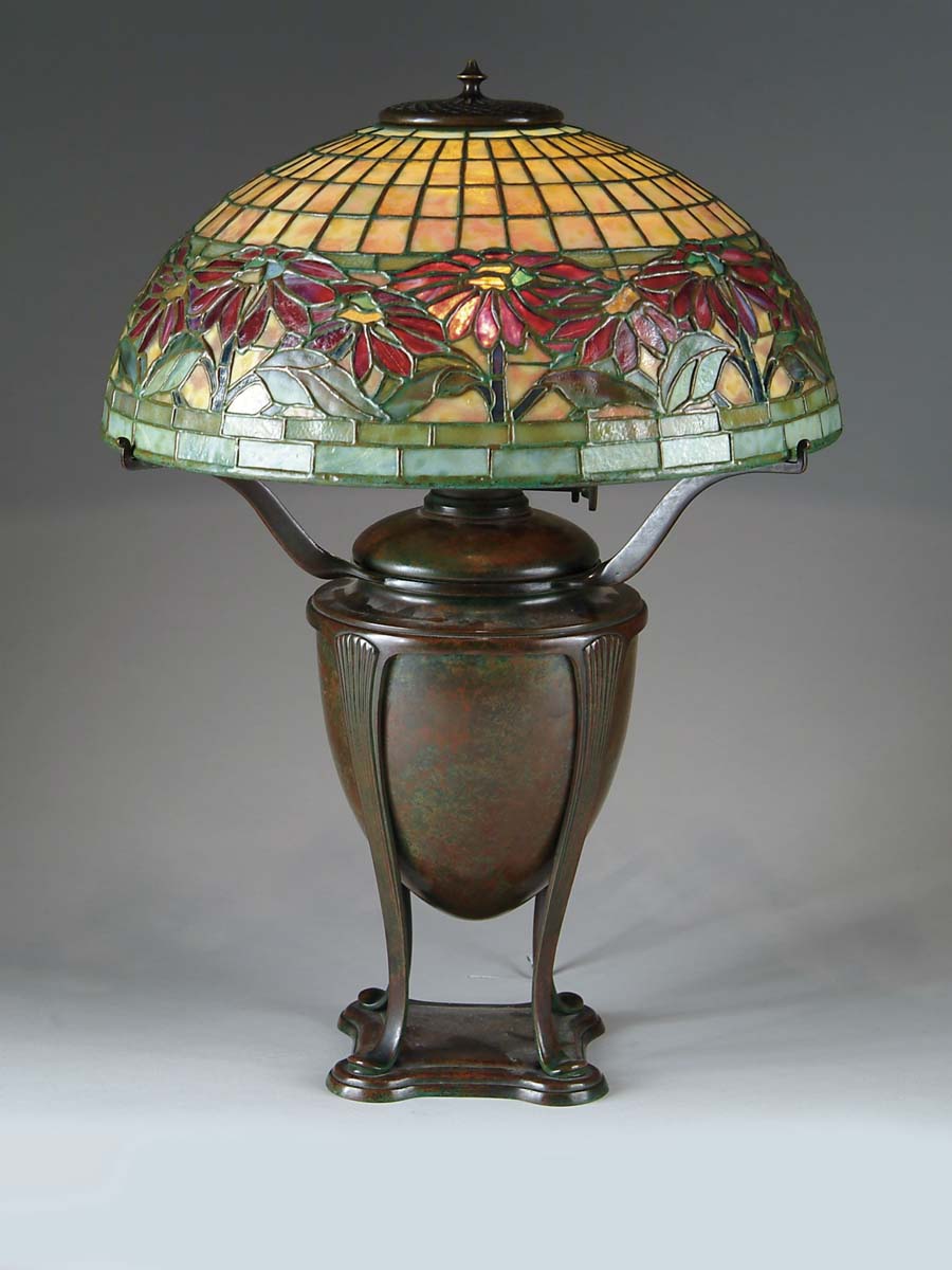 Appraisal: TIFFANY STUDIOS POINSETTIA LAMP Beautiful shade begins with a heavily