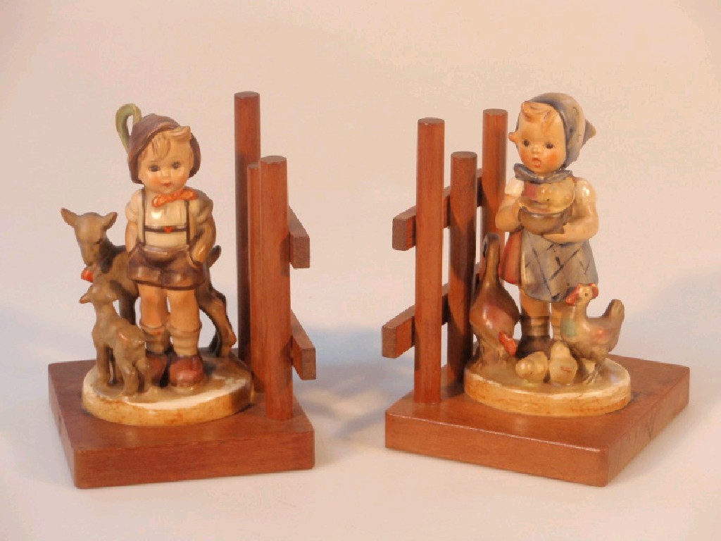 Appraisal: A pair of Hummel book ends mounted with children and