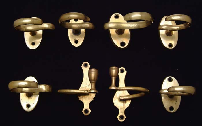 Appraisal: EIGHT BRASS JAM HOOKS Lot consists of a good pair