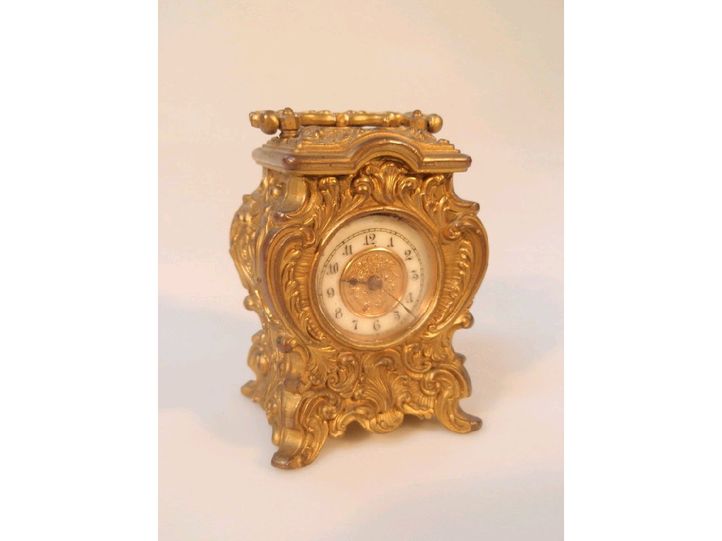 Appraisal: An early thC gilt metal carriage clock with a timepiece