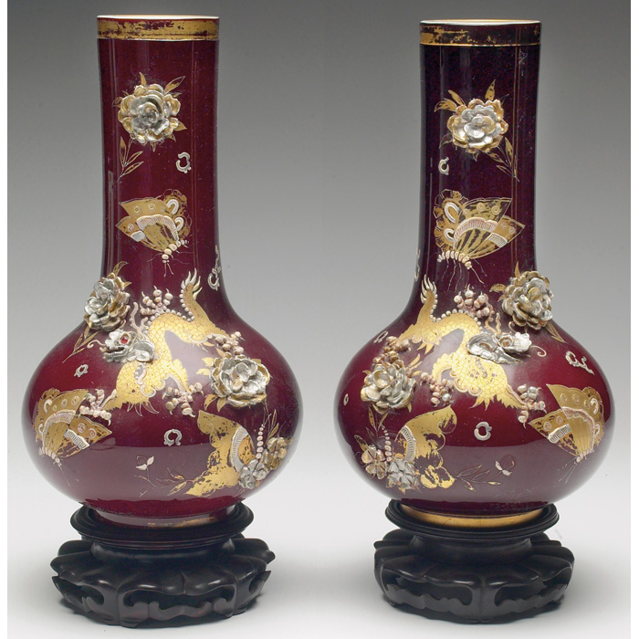 Appraisal: Oriental vases pair maroon cased glass with painted gold dragon