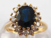 Appraisal: A carat gold sapphire and diamond ring sapphire approx x