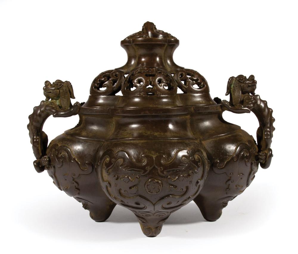 Appraisal: Chinese Bronze Covered Censer lobed cover modeled with openwork dragons