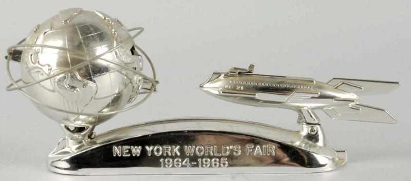 Appraisal: White Metal New York World's Fair Bank Description Rare Rocket