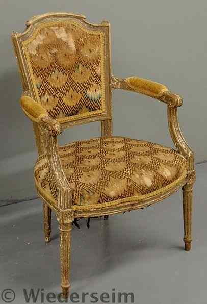 Appraisal: French fauteuil th c with flame stitched upholstery and knees