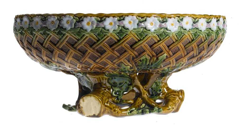 Appraisal: A MINTONS MAJOLICA BASKET CENTREPIECE the low circular blind trellis