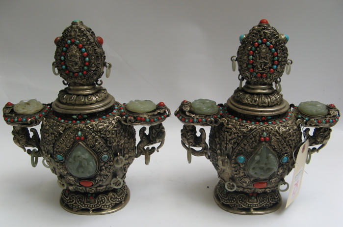 Appraisal: PAIR OF COVERED SILVERED METAL TEMPLE VASES Jade Turquoise and