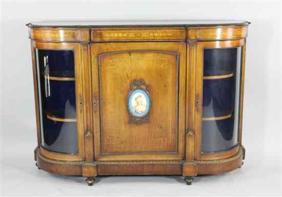 Appraisal: A Victorian inlaid walnut credenza the panelled door inset with