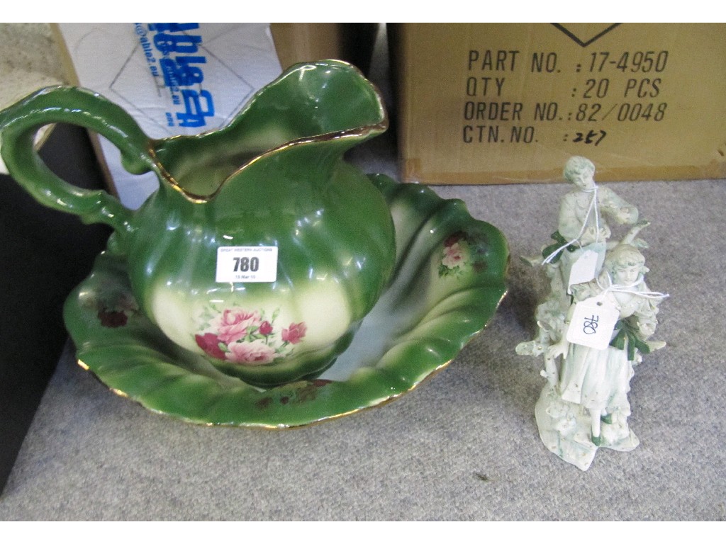 Appraisal: Pair of Bisque figures and a Staffordshire Ironstone ewer and