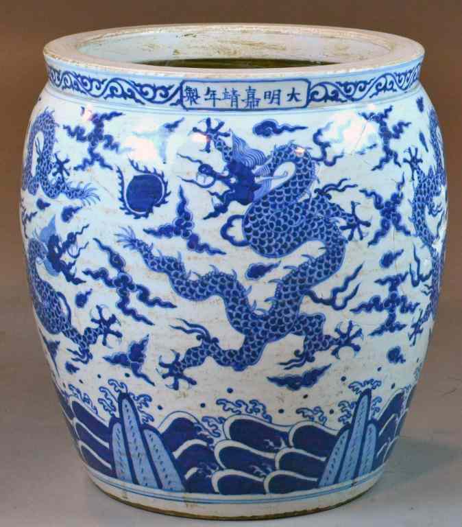 Appraisal: Chinese Blue White Porcelain PotFinely painted to depict four dragons