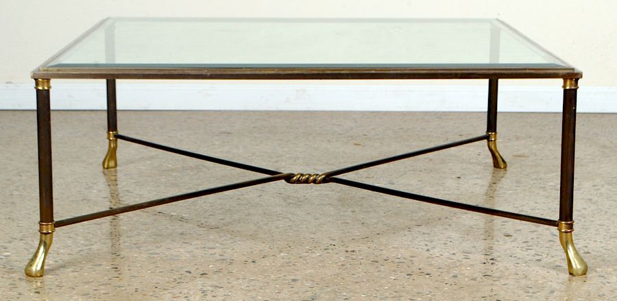 Appraisal: BRONZE COFFEE TABLE GLASS TOP MANNER OF JANSEN A two