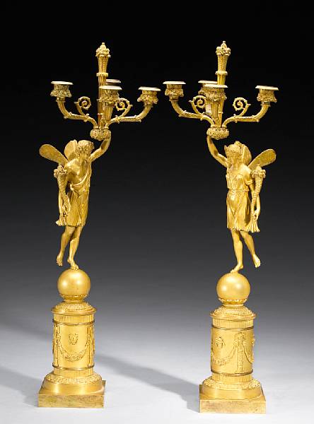 Appraisal: A pair of Empire gilt bronze figural four light candelabra