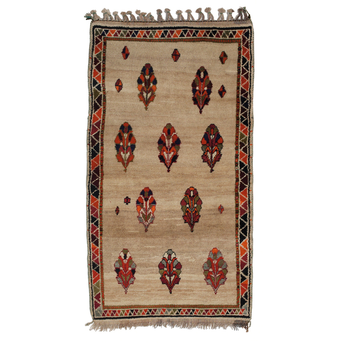 Appraisal: Persian Gabbeh rug wool ivory field with red and orange