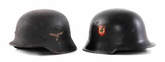 Appraisal: German World War II combat and police helmets M combat