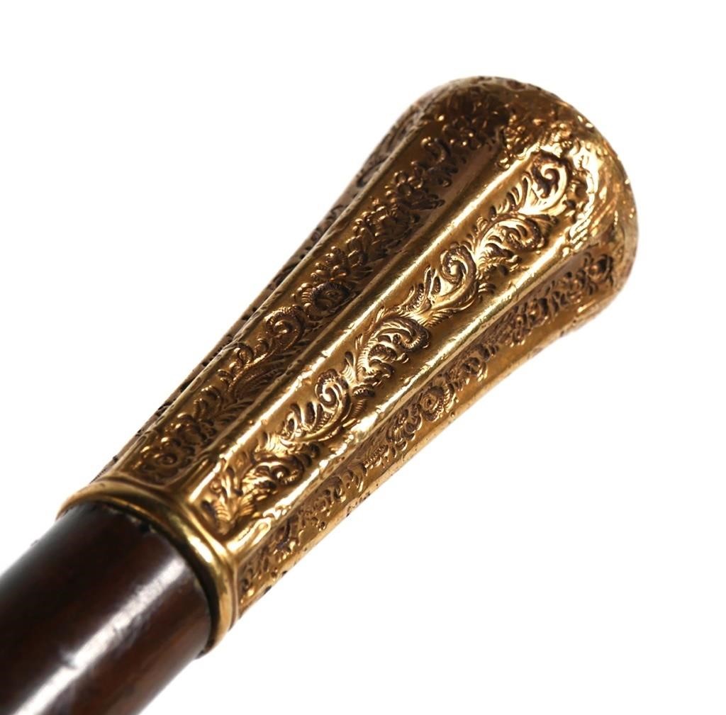 Appraisal: Antique Victorian gold topped handle walking cane Slim sided hand