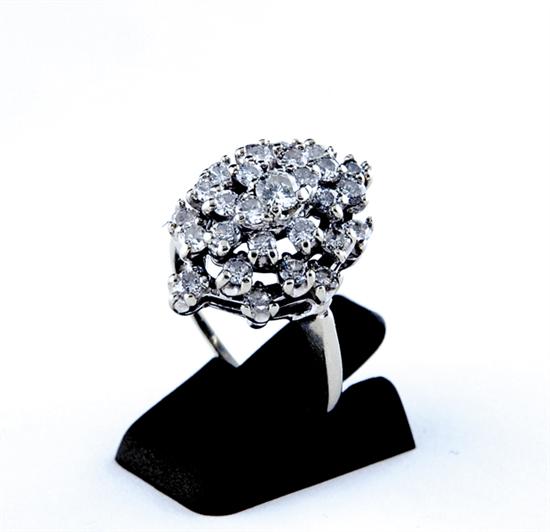 Appraisal: Diamond cluster and gold ring twenty-seven brilliant-cut diamonds weighting approx