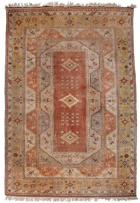 Appraisal: Turkish Carpet th century orange central filed with three diamond