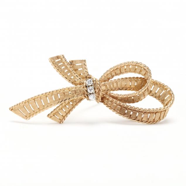 Appraisal: Gold and Diamond Bow Brooch Dan Frere Double ribbon motif