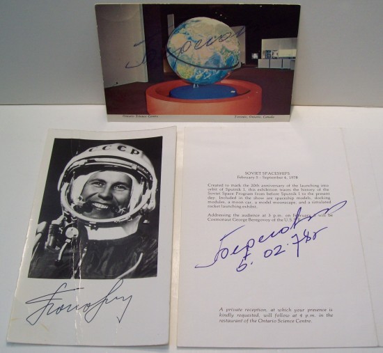 Appraisal: ASTRONAUTS Group of three items Signed by Ukrainian cosmonauts Pavel