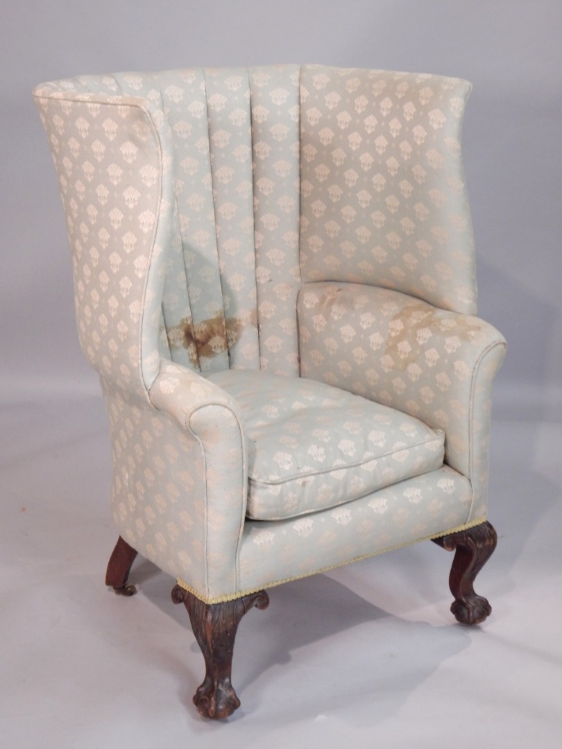 Appraisal: Howard Sons Berners Street London A late thC wingback armchair