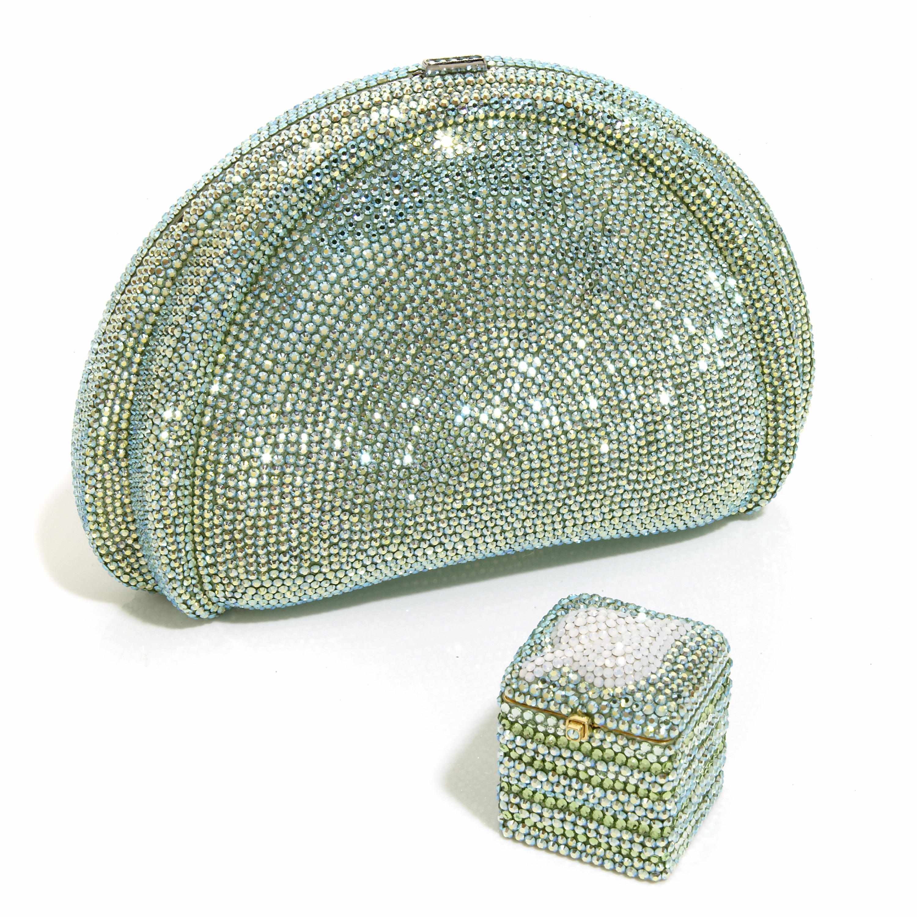 Appraisal: A green crystal purse with fanned sides together with a