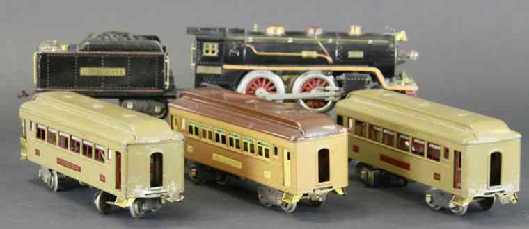 Appraisal: LIONEL E LOCOMOTIVE WITH PASSENGER TRAINS E Locomotive and T