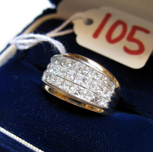 Appraisal: DIAMOND AND FOURTEEN KARAT GOLD RING The top of the