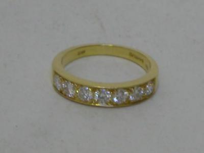 Appraisal: A DIAMOND HALF ETERNITY RING the ct gold band inset