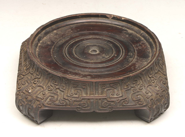 Appraisal: A CHINESE ZITAN WOOD CARVED STAND of square form with